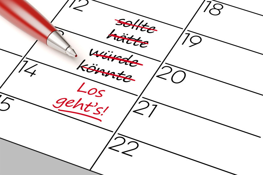 Motivation als Termin im Kalender von einem roten Stift markiert